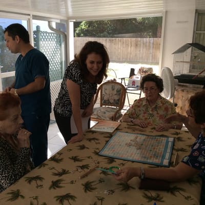 Residents engaged in a board game activity