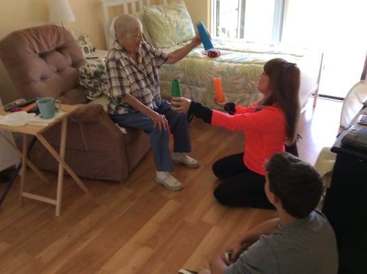 Residents engaging in an activity session inside the facility