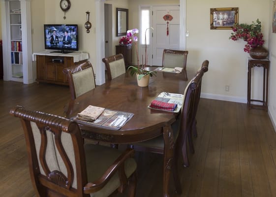 Dining area with a wooden table and chairs