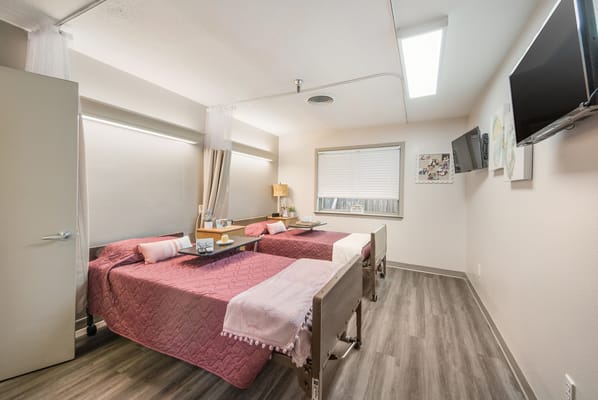 Bright and spacious resident room with two beds