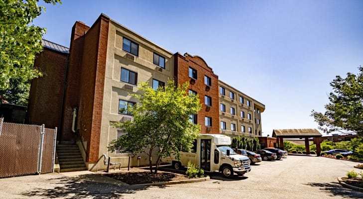 Exterior view of the facility with parking area