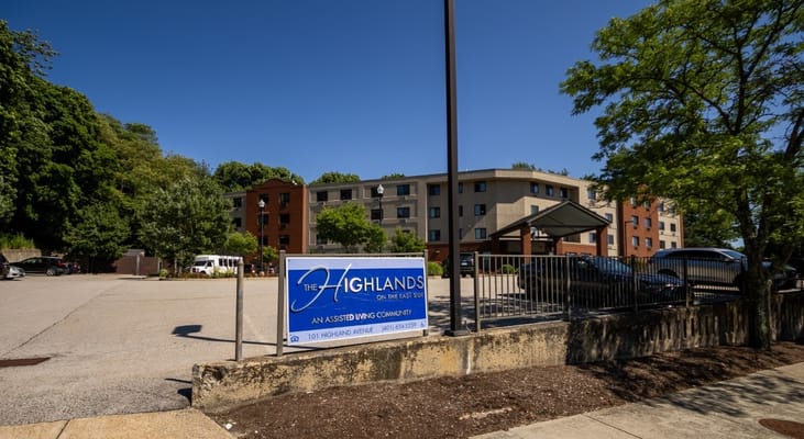 Exterior view of Highlands on the East Side with parking area