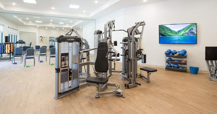 Modern gym equipment in a bright fitness center