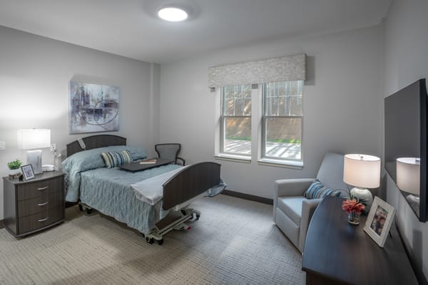 Interior view of a spacious resident room with natural light