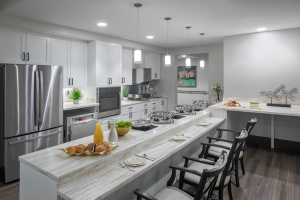 Bright dining area with food and drinks displayed