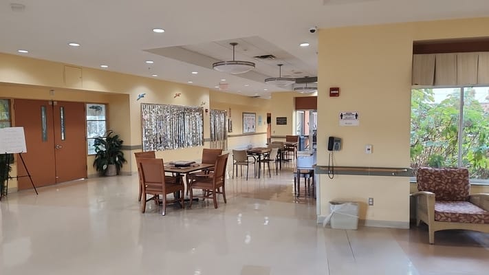 Bright lounge area with tables and chairs