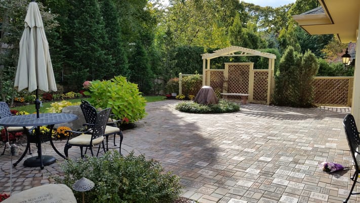 Beautiful outdoor space with a garden and seating area