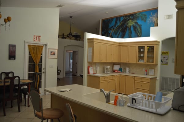 Interior view of the kitchen area in Violet Gardens Assisted Living Facility.
