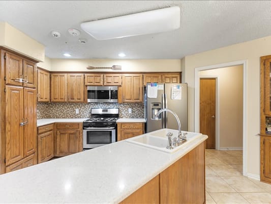 Bright kitchen area in a modern assisted living facility
