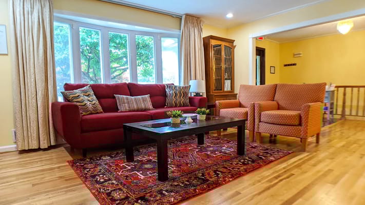 A cozy common area with seating and warm lighting