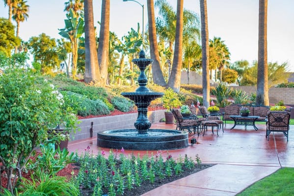 Beautiful outdoor courtyard with a fountain and seating
