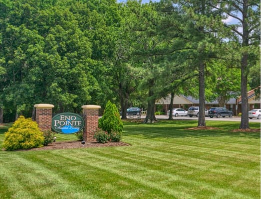 Well-maintained grounds with facility signage