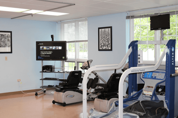 Rehabilitation equipment in a bright interior fitness area
