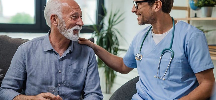 Caregiver interacting warmly with a resident