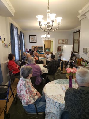 Residents participating in an engaging activity in a common area