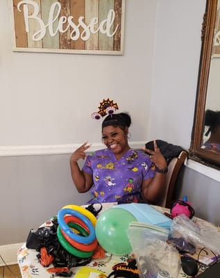 Staff member celebrating with decorations and activities