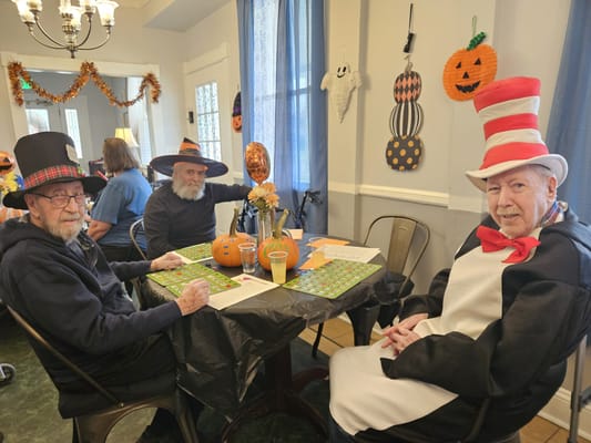 Residents enjoying a Halloween-themed bingo game