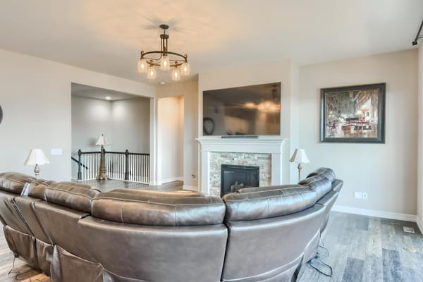 Cozy common area with seating and a fireplace