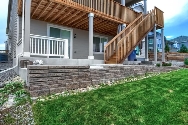 Outdoor patio area with wooden stairs