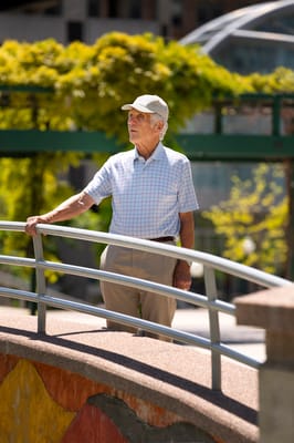 Senior man enjoying a moment outdoors in a sunny setting