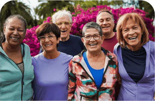 Residents smiling together in a garden