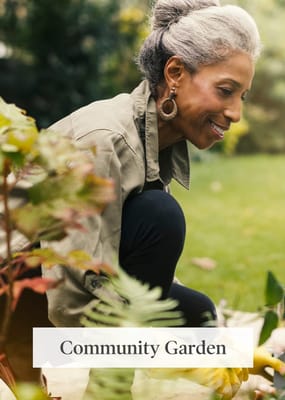 Resident tending to a community garden