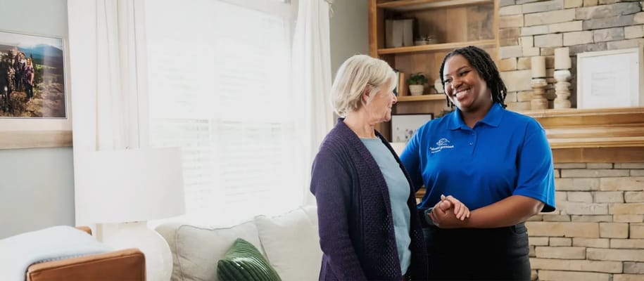 Staff member interacting with a resident in a common area