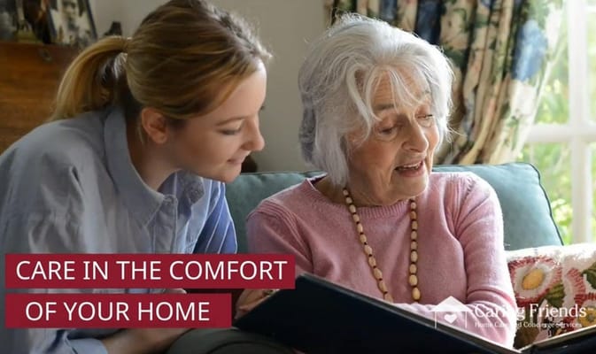 Caregiver reading with a senior resident