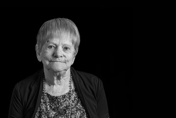 Portrait of an elderly woman in black and white
