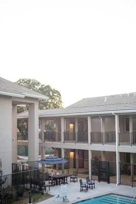 View of the outdoor space with seating and pool area