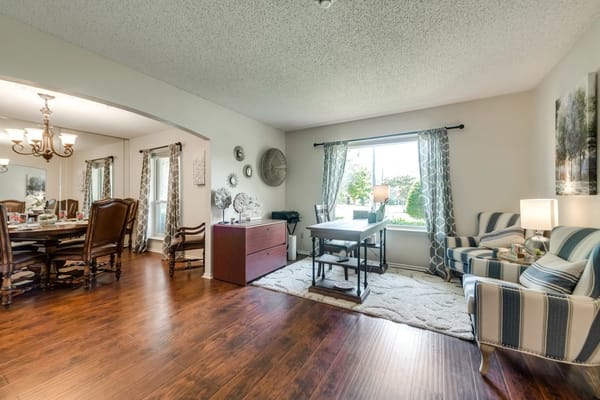 Bright activity room with comfortable seating and decor