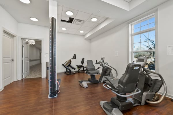 Well-equipped fitness area in a senior living facility