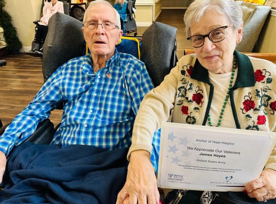 Residents celebrating Veteran's Day with a certificate