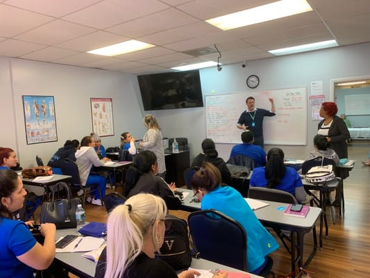 Staff training session in an indoor classroom