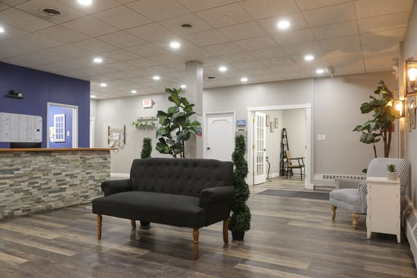 Interior view of a cozy lobby area with seating