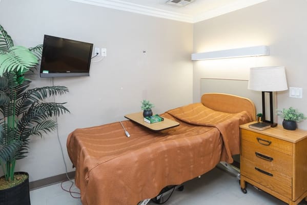 Cozy resident room with bed and decor