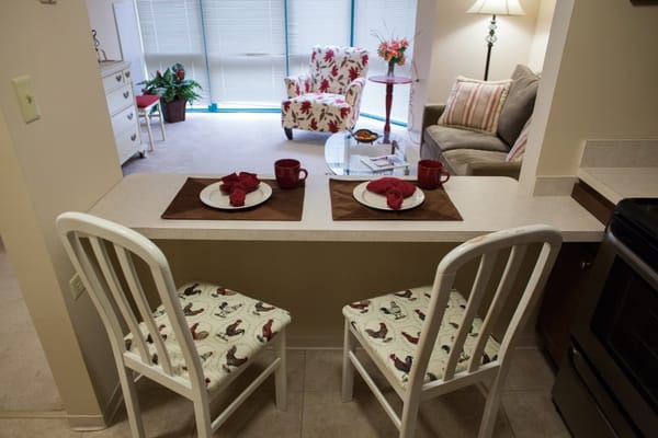 Cozy dining area with table settings in an apartment