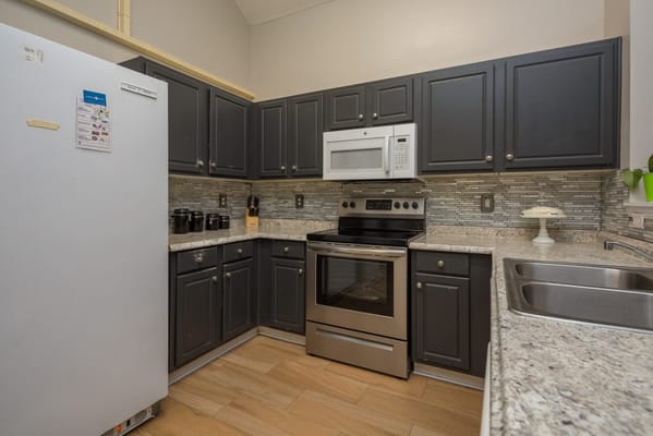 Bright kitchen area with modern appliances