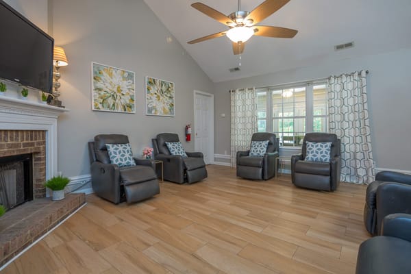 Bright common area with comfortable seating and decor