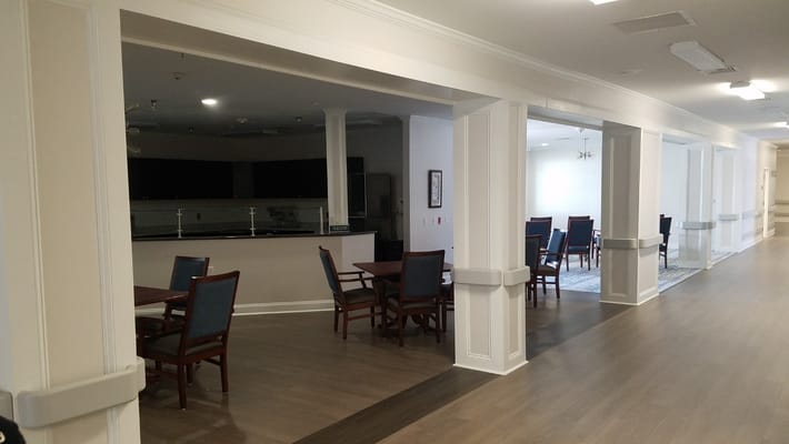 Dining area with tables and chairs in a nursing home
