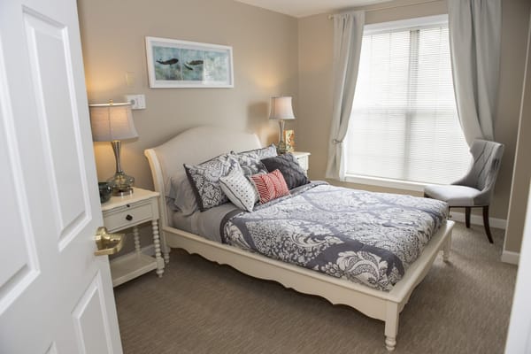 Cozy private bedroom in a senior living facility