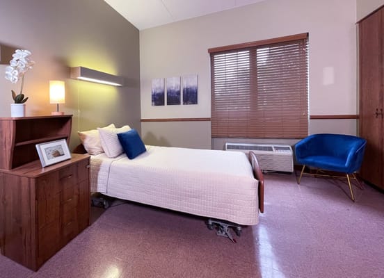 Cozy resident room with a bed and decor