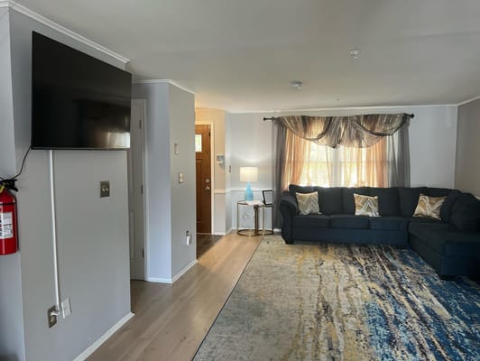 Cozy living room with a sofa and lamp