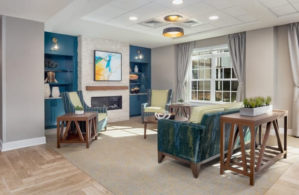 Bright common area with comfortable seating and decor