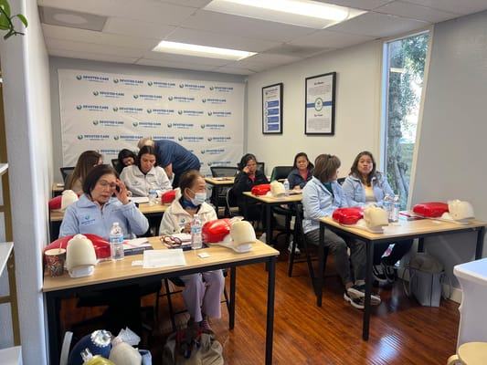 Staff training session in a classroom with participants engaged