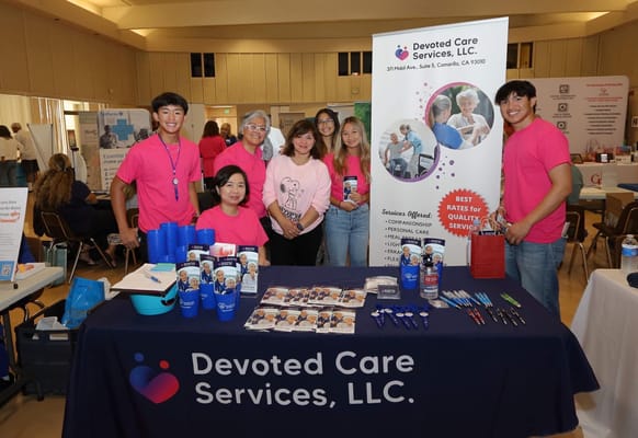 Staff members at the Devoted Care Services booth