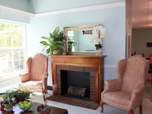 Cozy common area with chairs and plants