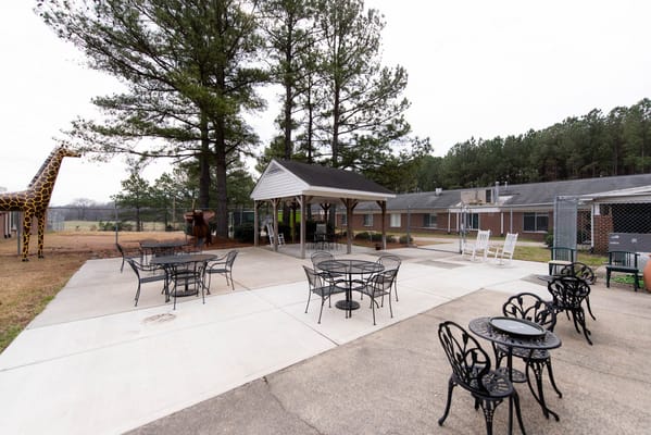 Outdoor space with seating and shade structure