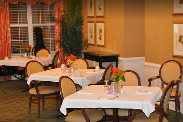 Dining room with decorated tables and chairs