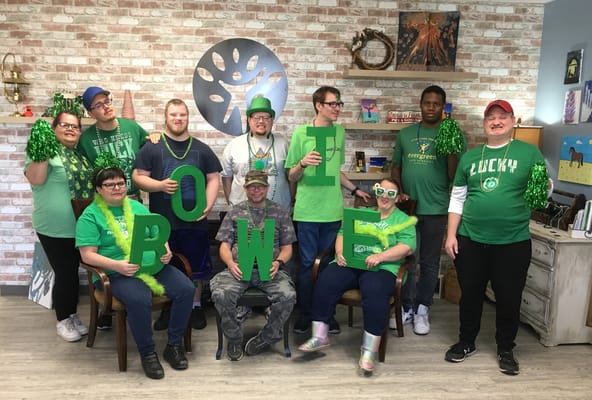 Residents and staff celebrating in a common area